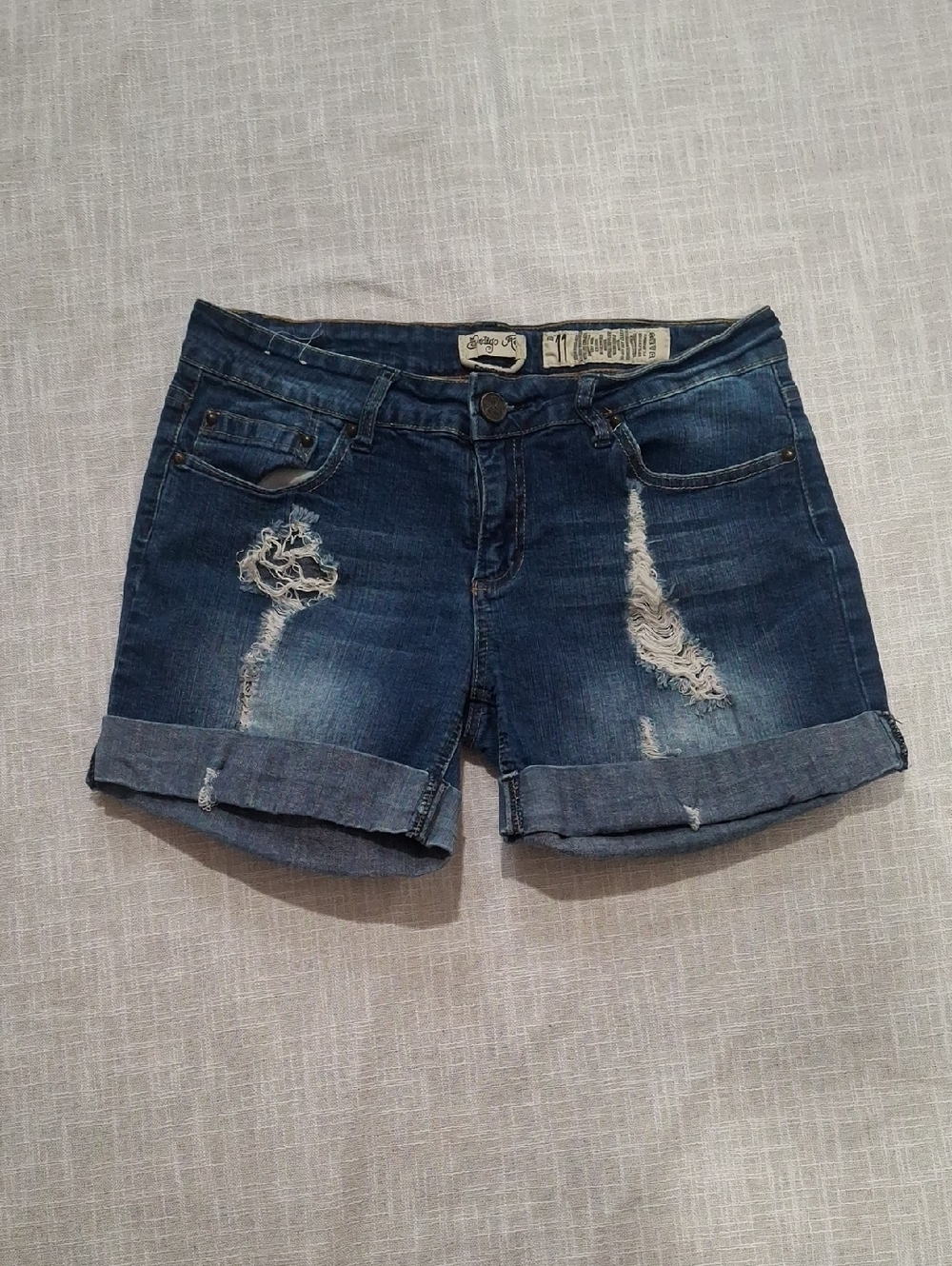 Indigo Rein Dark Blue Distressed Roll-Cuff Jean Shorts